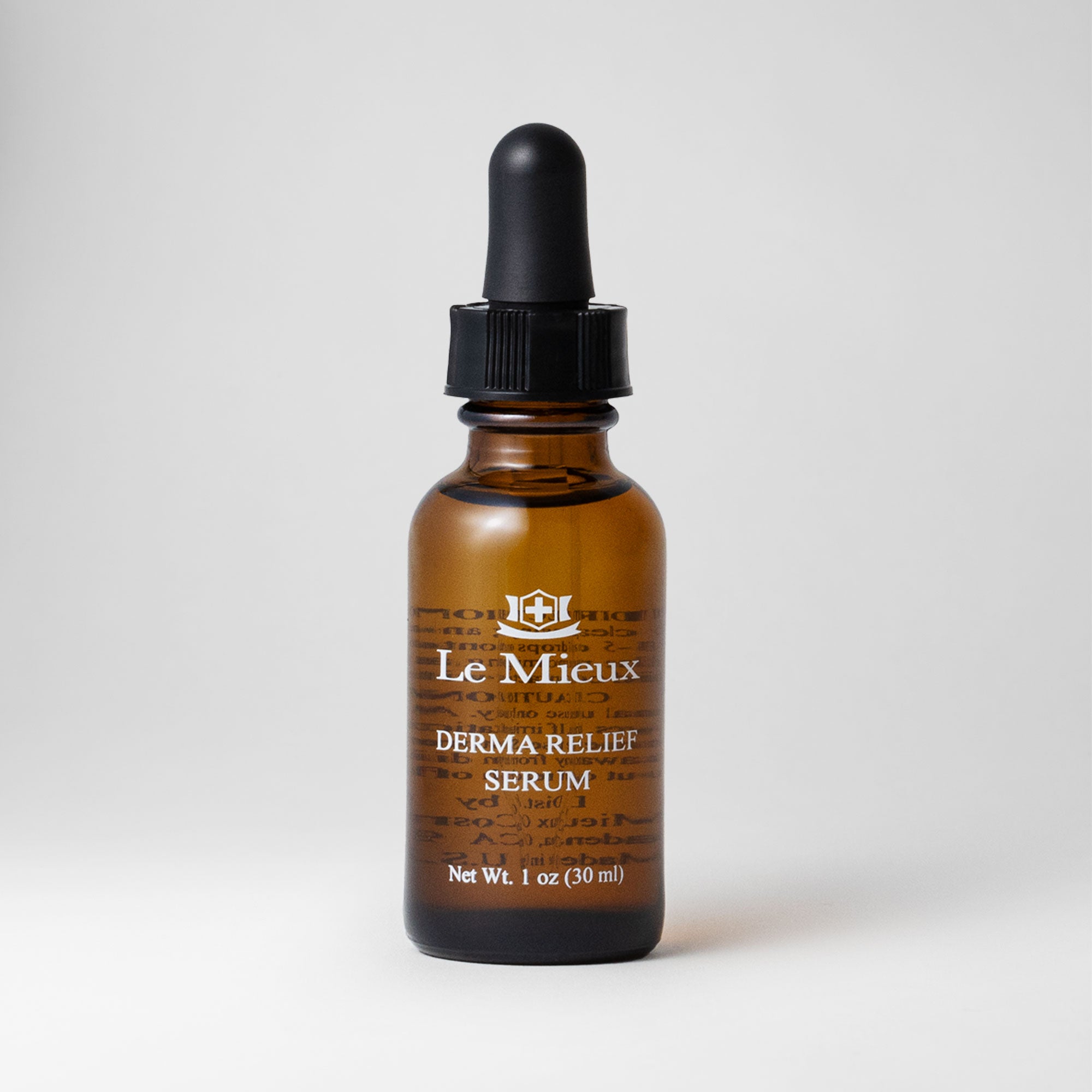 Derma Relief Serum 1 oz amber bottle with black dropper lid isolated on a light grey background